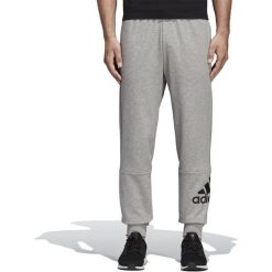 ADIDAS MUST HAVES FRENCH TERRY BADGE OF SPORT > DT9959. Spodnie męskie Adidas, xl, z aplikacjami, z bawełny, klasyczne. Za 199,99 zł.