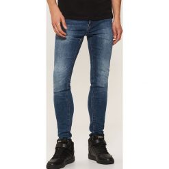 Jeansy skinny - Niebieski. Niebieskie jeansy męskie marki House, z jeansu. Za 99,99 zł.