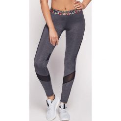 Damskie legginsy sportowe Gori. Szare legginsy sportowe damskie marki Astratex, w kolorowe wzory, ze skóry. Za 71,99 zł.