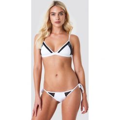 Stroje dwuczęściowe damskie: Calvin Klein Dół bikini String Side Tie Bikini-LR – White