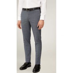 Mango Man - Spodnie Paulo. Szare spodnie męskie Mango Man, na co dzień, bez wzorów, z elastanu. Za 229,90 zł.
