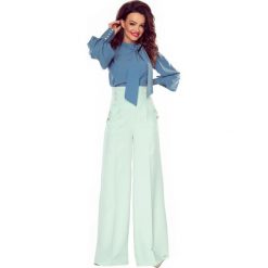 PATI śliczna bluzka z kokardą (jeans) Niebieski. Niebieskie bluzki damskie Bergamo, s, bez wzorów, z elastanu, bez kołnierzyka, bez rękawów. Za 139,00 zł.