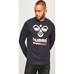 Hummel - Bluza. Niebieskie bluzy męskie Hummel, s, z nadrukiem, z bawełny, z okrągłym kołnierzem. W wyprzedaży za 129,90 zł.