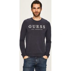 Guess Jeans - Bluza. Czarne bluzy męskie Guess Jeans, s, z aplikacjami, z elastanu, z okrągłym kołnierzem, bez rękawów, bez kaptura. W wyprzedaży za 229,90 zł.