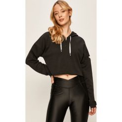 Reebok - Bluza. Czarne bluzy damskie Reebok, s, bez wzorów, z bawełny, z krótkim rękawem, krótkie, z kapturem. W wyprzedaży za 129,90 zł.