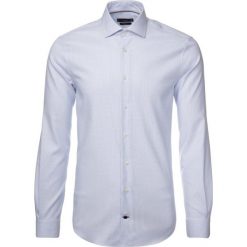 Koszula Tommy Hilfiger Tailored TT0TT05568. Białe koszule męskie Tommy Hilfiger Tailored, m, bez wzorów, z elastanu, casualowe, bez kołnierzyka, bez rękawów. W wyprzedaży za 189,00 zł.