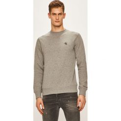 Calvin Klein Jeans - Bluza. Czarne bluzy męskie Calvin Klein Jeans, xl, bez wzorów, z bawełny, z okrągłym kołnierzem, bez rękawów, bez kaptura. W wyprzedaży za 279,90 zł.