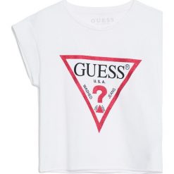Guess Jeans - Top dziecięcy 118-175 cm. Białe bluzki dziewczęce Guess Jeans, z nadrukiem, z elastanu, z okrągłym kołnierzem, z krótkim rękawem, krótkie, bez kaptura. Za 89,90 zł.