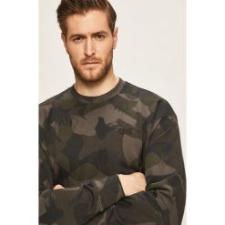 Levi's - Bluza. Czerwone bluzy męskie Levi's®, s, bez wzorów, z bawełny, z okrągłym kołnierzem, bez rękawów, bez kaptura. W wyprzedaży za 249,90 zł.