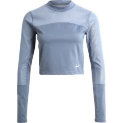 Nike Performance POWER Koszulka sportowa armory blue/reflective silver. Niebieskie topy sportowe damskie marki Nike Performance, xl, z elastanu. W wyprzedaży za 129,35 zł.
