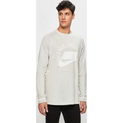 Nike Sportswear - Bluza. Czarne bluzy męskie Nike Sportswear, m, z nadrukiem, z poliesteru, z okrągłym kołnierzem, bez rękawów, bez kaptura. W wyprzedaży za 179,90 zł.
