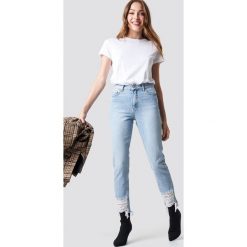NA-KD Jeansy z rozdarciami - Blue. Niebieskie spodnie z wysokim stanem NA-KD, z jeansu. Za 202,95 zł.