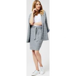 Spódnica w kratkę z wiązaniem. Szare spódniczki damskie Moodo, xs, w kratkę, z elastanu, ołówkowe. Za 59,99 zł.