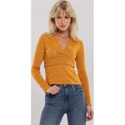 Żółty Sweter Malaya. Żółte swetry damskie Renee, s, bez wzorów, casualowe, bez rękawów, długie, bez kaptura. Za 79,99 zł.