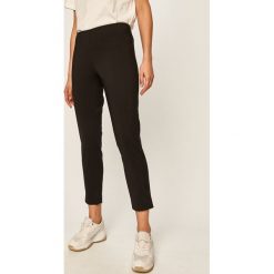 Dkny - Spodnie. Czarne spodnie damskie DKNY, z elastanu. Za 399,90 zł.