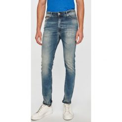 Tommy Jeans - Jeansy. Niebieskie jeansy męskie Tommy Jeans, bez wzorów. W wyprzedaży za 299,90 zł.