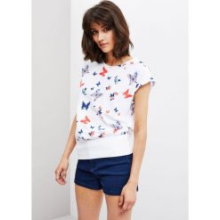 Bluza z nadrukiem. Białe bluzy damskie Moodo, xs, z nadrukiem, bez rękawów, bez kaptura. Za 19,99 zł.