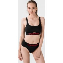 Calvin Klein Górna część stroju kąpielowego Czarny. Czarne stroje kąpielowe damskie Calvin Klein, xs, bez wzorów, z elastanu. Za 288,95 zł.