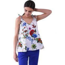 Top w kolorze białym ze wzorem. Białe bluzki damskie Modne letnie stylizacje, xs, bez wzorów, bez kołnierzyka, bez rękawów. W wyprzedaży za 109,95 zł.