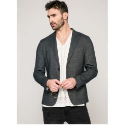Tommy Hilfiger - Marynarka. Niebieskie marynarki męskie TOMMY HILFIGER, bez wzorów, z elastanu. W wyprzedaży za 599,90 zł.