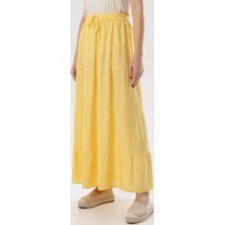 Żółta Spódnica Juline. Żółte spódniczki damskie Born2be, xl, bez wzorów, maxi. W wyprzedaży za 49,99 zł.