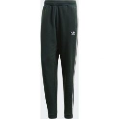 Spodnie męskie: Adidas Spodnie dresowe męskie 3-Stripes zielone r. S (CX1898)