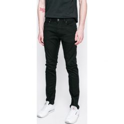Diesel - Jeansy Thommer. Czarne jeansy męskie Diesel, bez wzorów. W wyprzedaży za 359,90 zł.