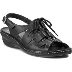 Sandały COMFORTABEL - 710521 Schwarz 1. Czarne klapki damskie Comfortabel, bez wzorów, ze skóry, bez obcasa, na koturnie. W wyprzedaży za 169,00 zł.