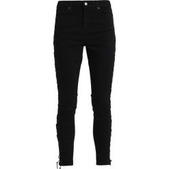 Topshop JAMIE Jeans Skinny Fit black. Czarne rurki damskie marki Topshop. W wyprzedaży za 231,20 zł.