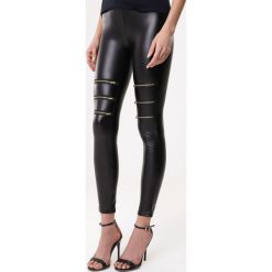 Czarne Legginsy Observative. Czarne legginsy damskie marki Born2be, xl, bez wzorów. Za 39,99 zł.