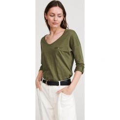 Koszulka z bawełny organicznej - Khaki. Brązowe koszulki damskie Reserved, s, bez wzorów, z bawełny, bez kołnierzyka. Za 39,99 zł.