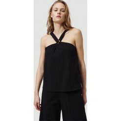 O'Neill Jade Top Czarny. Czarne podkoszulki damskie O'Neill, xl, bez wzorów, z bawełny, bez kołnierzyka, bez rękawów. Za 180,95 zł.