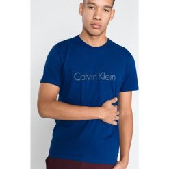 Calvin Klein Koszulka do spania Niebieski. Niebieskie koszulki męskie Calvin Klein, l, bez wzorów, z bawełny, bez kołnierzyka, bez rękawów. Za 171,95 zł.