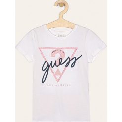 Guess Jeans - T-shirt dziecięcy 118-175 cm. Bluzki dziewczęce Guess Jeans, z nadrukiem, z elastanu, z okrągłym kołnierzem, z krótkim rękawem, krótkie, bez kaptura. Za 89,90 zł.