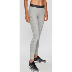 Under Armour - Legginsy. Szare legginsy damskie marki Under Armour, s, z nadrukiem, z elastanu. Za 149,90 zł.