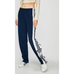 Adidas Originals - Spodnie. Niebieskie spodnie damskie adidas Originals, z poliesteru. W wyprzedaży za 219,90 zł.