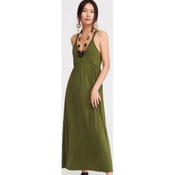 Długa dzianinowa sukienka - Khaki. Brązowe sukienki damskie Reserved, s, bez wzorów, z dzianiny, bez kołnierzyka, z długim rękawem, długie, maxi. W wyprzedaży za 49,99 zł.