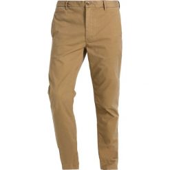 Chinosy męskie: Scotch & Soda WARREN Spodnie materiałowe sand