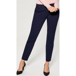 Chinosy damskie: Bawełniane spodnie chino fit – Niebieski