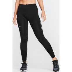 Legginsy do biegania RUN WARM damskie. Czarne legginsy sportowe damskie KALENJI, xs, bez wzorów, z elastanu, do biegania. Za 49,99 zł.