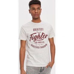 T-shirt z nadrukiem - Kremowy. Białe t-shirty męskie House, s, z nadrukiem, bez kołnierzyka. Za 39,99 zł.
