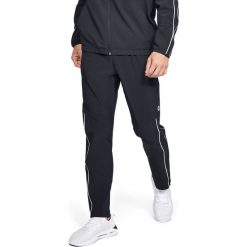 Under Armour Spodnie dresowe Czarny. Czarne spodnie męskie Under Armour, l, bez wzorów, z bawełny. Za 550,95 zł.