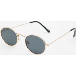 Okulary z owalnymi szkłami. Żółte okulary przeciwsłoneczne damskie marki Pull&Bear, owalne. Za 49,90 zł.