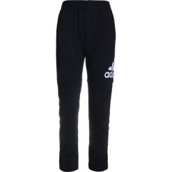 Adidas Performance LOGO PANT Spodnie treningowe black/white. Różowe spodnie chłopięce marki adidas Performance, z dzianiny, z okrągłym kołnierzem. Za 149,00 zł.