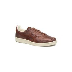Buty Asics Gsm. Pomarańczowe trampki i tenisówki damskie Asics, bez wzorów, bez zapięcia. Za 274,80 zł.