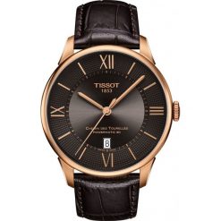 RABAT ZEGAREK TISSOT T-Classic T099.407.36.448.00. Pomarańczowe zegarki męskie marki TISSOT, ze stali. W wyprzedaży za 3212,00 zł.