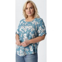 Niebieska Bluzka Pherophonos. Niebieskie bluzki damskie Born2be, xl, z aplikacjami, z jeansu, z okrągłym kołnierzem, plus size, z krótkim rękawem. Za 59,99 zł.
