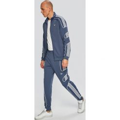 Adidas Originals - Spodnie. Szare spodnie męskie adidas Originals, na co dzień, m, z nadrukiem, z bawełny, casualowe. W wyprzedaży za 239,90 zł.
