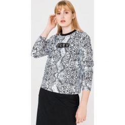 DKNY Bluza Czarny Biały. Czarne bluzy damskie DKNY, m, bez wzorów, z bawełny, bez rękawów, bez kaptura. Za 338,95 zł.