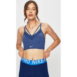 Nike - Biustonosz sportowy. Niebieskie biustonosze sportowe damskie Nike, s, bez wzorów, z elastanu, dri-fit (nike). W wyprzedaży za 89,90 zł.